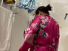 Tanned Latina in bathrobe twerks